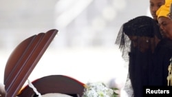 Former first lady of Zimbabwe, Grace Mugabe, pays her last respects during a state funeral of her husband and the country's longtime ruler Robert Mugabe, at the national sports stadium in Harare, Sept. 14, 2019. 