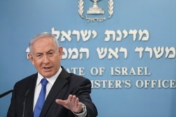 Israel's Prime Minister Benjamin Netanyahu announces full diplomatic ties will be established with the United Arab Emirates, during a news conference on Aug. 13, 2020 in Jerusalem.