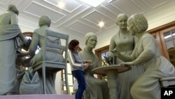 Still image from video, sculptor Meredith Bergmann works on the first women's statue that will be installed in New York's Central Park, in her studio in Ridgefield, Connecticut, Nov. 4, 2019.