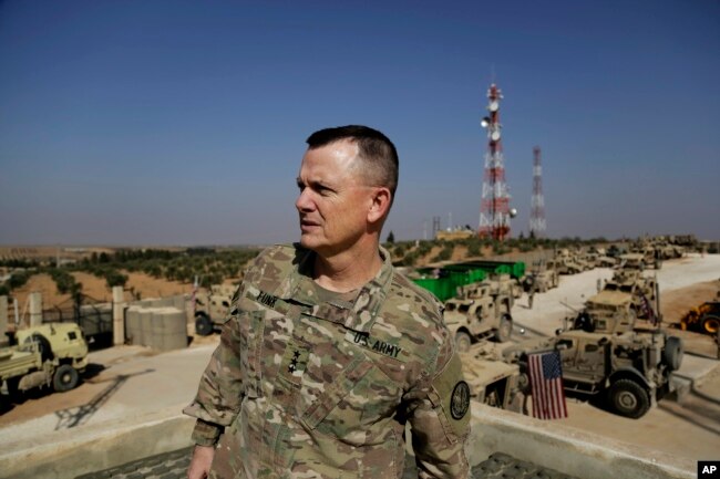 U.S. Army Lt. Gen. Paul E. Funk speaks to the Associated Press at an American outpost in the northern Kurdish town of Manbij, Syria, Feb. 7, 2018.