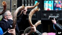 FILE—Jewish people and sympathizers blow shofars and whistles in London, March 10, 2024 to show solidarity with the 100 plus hostages held in Gaza. The 'blow' lasted for 1.55 minutes marking the 155 days they have spent in captivity.