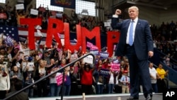 Republican presidential candidate Donald Trump arrives to speak at a campaign rally, Friday, Oct. 21, 2016, in Johnstown, Pa. (AP Photo/ Evan Vucci)