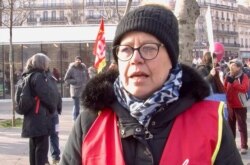 Nathalie Wiseur, 52, says she's demonstrating to ensure future generations get the same benefits she has, in Paris, Jan 24, 2020. (LIsa Bryant/VOA)