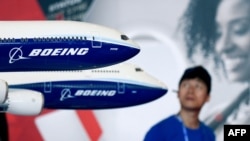 Model Boeing 777X ditampilkan di Airshow China 2018 di Zhuhai di Guan/AFP China selatan)