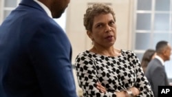 FILE - U.S. District Judge Tanya Chutkan, right, converses at the Department of Justice in Washington, Jan. 16, 2025.