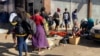 Zimbabwe vendors, pictured in Harare, June 26, 2021, will soon be asked to have COVID-19 vaccination certificates if they are to continue trading, Vice President Constantino Chiwenga says. (Columbus Mavhunga/VOA)