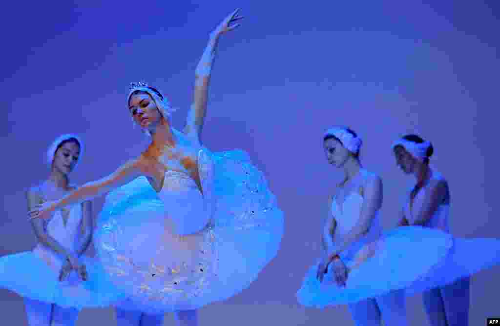 Dancers of the Royal Ballet of Russia perform a scene in Swan Lake during a rehearsal at the Colon Theater in Bogota, Colombia, Jan. 29, 2020.