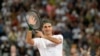 Roger Federer dari Swiss bereaksi setelah kemenangannya melawan petenis Spanyol Rafael Nadal selama pertandingan tenis mereka di The Match di Afrika di Stadion Cape Town, di Cape Town. (Foto: AFP)