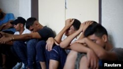 Relatives of Palestinian gunmen who were killed by Israeli forces as they tried to cross the Gaza border, react at a hospital in the northern Gaza Strip August 18, 2019.