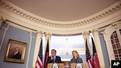 U.S. Secretary of State Hillary Clinton and Afghan Foreign Minister Zalmai Rassoul meet with reporters at the State Department in Washington, March 21, 2012