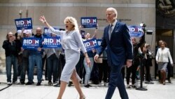 Democratic presidential candidate former Vice President Joe Biden, accompanied by his wife Jill arrives to speak to members of the press at the National Constitution Center in Philadelphia, March 10, 2020.