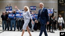 Democratic presidential candidate former Vice President Joe Biden, accompanied by his wife Jill, speaks to members of the press at the National Constitution Center in Philadelphia, March 10, 2020