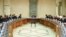 FILE - Syria's President Bashar al-Assad heads a meeting of his cabinet in Damascus.