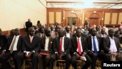 Members of South Sudan rebel delegation attend the opening ceremony of South Sudan's negotiation in Ethiopia's capital Addis Ababa, Jan. 4, 2014. 