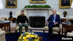 U.S. President Joe Biden meets with Ukraine's President Volodymyr Zelenskyy at the White House in Washington, Sept. 26, 2024. 