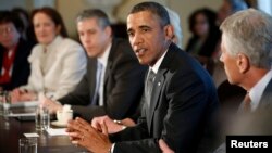 U.S. President Barack Obama participates in his first cabinet meeting of his second term in the Cabinet Room of the White House, Mar. 4, 2013.