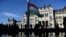 FILE - The official flag-raising ceremony for the 66th anniversary of Hungarian anti-communist uprising of 1956 in front of the Parliament in Budapest, Hungary on Oct. 23, 2022. 