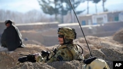 An Australian soldier takes position during a NATO/ISAF joint task force patrol in Mirwais in the southern province of Uruzgan in Afghanistan (File)