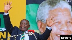 South African Deputy President Cyril Ramaphosa attends a rally to commemorate Nelson Mandela's centenary year in Cape Town, South Africa, Feb. 11, 2018.