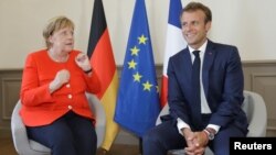 Daga hagu, Shugaban Jamus Angela Merkel da shugaban Faransa Emmanuel Macron 