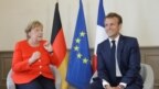 Bà Merkel và Tổng thống Emmanuel Macron của Pháp 