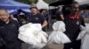 Malaysia Begins Exhuming Bodies of from Mass Graves