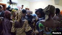 Some of the 21 Chibok school girls released are seen during a meeting with Nigeria's Vice President Yemi Osinbajo in Abuja, Nigeria, Oct. 13, 2016. 