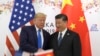 FILE - President Donald Trump poses for a photo with Chinese President Xi Jinping during a meeting on the sidelines of the G-20 summit in Osaka, Japan, Saturday, June 29, 2019. (AP Photo/Susan Walsh)