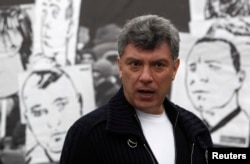 FILE - Opposition leader Boris Nemtsov attends a rally in central Moscow, April 6, 2013.