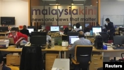 FILE - A general view of Malaysiakini's newsroom in Kuala Lumpur, Malaysia, May 24, 2018. 