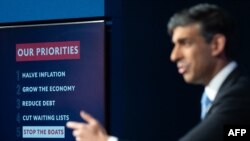 FILE - Britain's Prime Minister Rishi Sunak hosts a press conference inside the Downing Street Briefing Room, in central London on January 18, 2024, following the passing of the government's Rwanda Bill in the House of Commons.