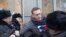 FILE - Russian opposition leader Alexei Navalny (C) is detained by police officers in Moscow, Jan. 28, 2018. 