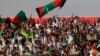 Afghan football fans watch a friendly match between Afghanistan and Pakistan in Kabul, Afghanistan, Aug., 20, 2013.