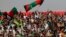 Afghan football fans watch a friendly match between Afghanistan and Pakistan in Kabul, Afghanistan, Aug., 20, 2013.