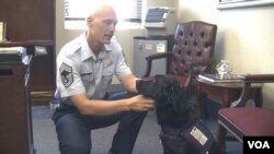 Chief Master Sgt. Richard Simonsen with his therapy dog, Yoko.