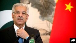 FILE - Pakistan's Foreign Minister Khawaja Asif is pictured during a press conference at the Diaoyutai State Guesthouse in Beijing, Sept. 8, 2017.