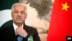 FILE - Pakistan's Foreign Minister Khawaja Asif is pictured during a press conference at the Diaoyutai State Guesthouse in Beijing, Sept. 8, 2017.