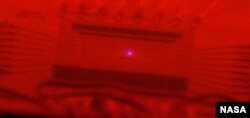 A silicon carbide ring oscillator glowing red hot (400C+) at NASA Glenn.