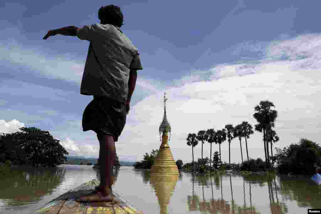 A pagoda seen in a flooded village at Kalay township at Sagaing division, Myanmar, Aug. 2, 2015.