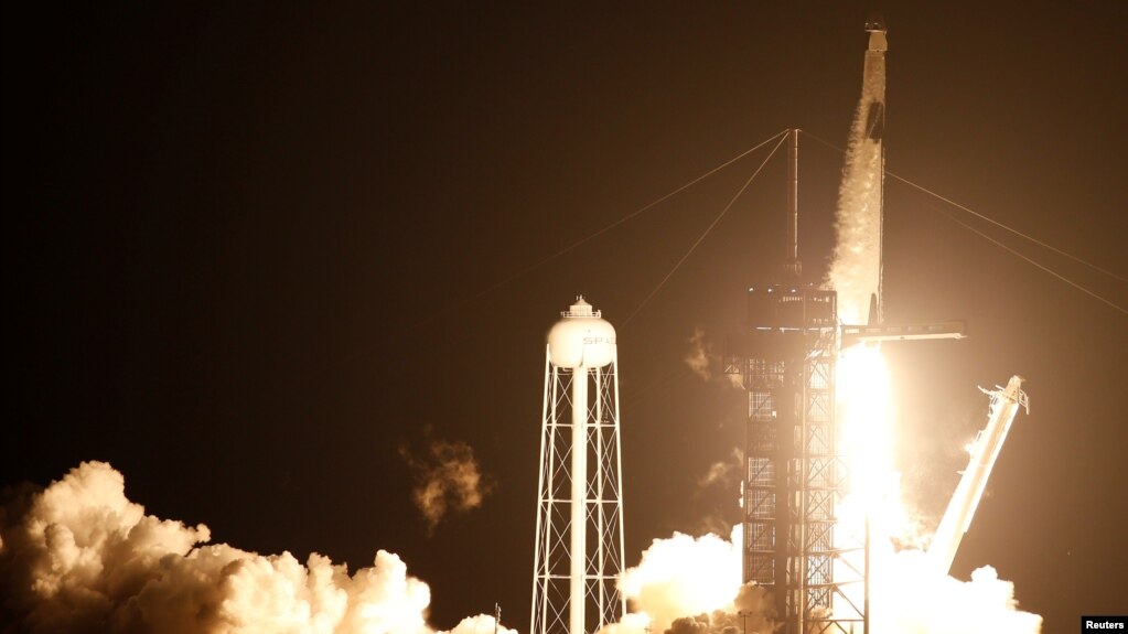A SpaceX Falcon 9 rocket, topped with the Crew Dragon capsule, is launched carrying four astronauts on the first operational NASA commercial crew mission at Kennedy Space Center in Cape Canaveral, Florida, U.S. November 15, 2020. REUTERS/Joe Skipper