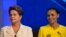 Brazil's President Dilma Rousseff, presidential candidate for re-election of the Workers Party, left, next to Marina Silva, presidential candidate of the Brazilian Socialist Party, as they arrive for a televised presidential debate in Rio de Janeiro, Oct.