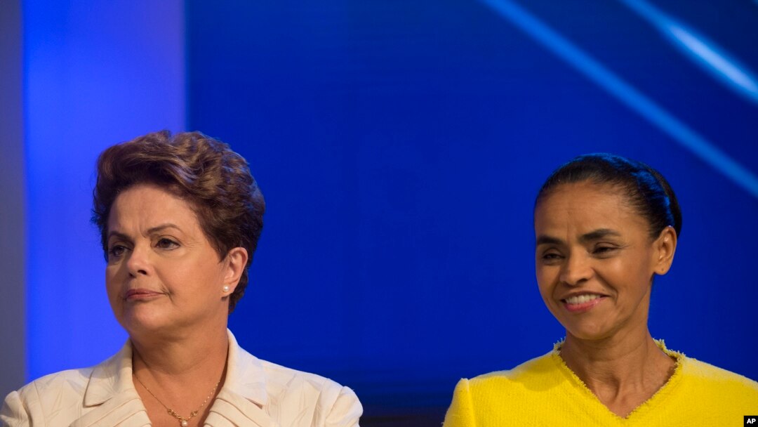 Presiden Brazil Dilma Rousseff, yang kembali mencalonkan diri dari Partai Buruh, kiri, Marina Silva, calon presiden dari Partai Sosialis Brazil.