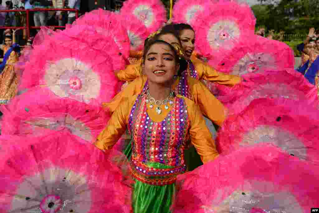 School students perform during a full dress rehearsal for the upcoming Indian Republic Day parade, in Chennai, India.
