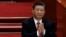 El presidente chino Xi Jinping aplaude en una sesión del Congreso Nacional del Pueblo, en Beijing, China, el 11 de marzo de 2024.