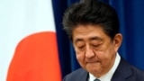 Japanese Prime Minister Shinzo Abe gestures during his press conference at the prime minister official residence in Tokyo on August 28, 2020. - Japan's Prime Minister Shinzo Abe announced on August 28, 2020 he will resign over health problems, in a…