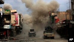 Three roadside bombs laid by Islamic State group militants explode in a western Mosul neighborhood, killing one of the Iraqi engineers attempting to defuse the devices, March 8, 2017.