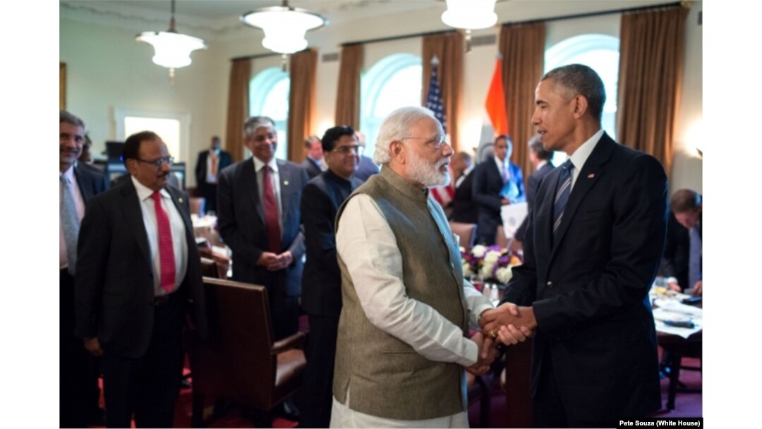 President Barack Obama and Prime Minister Narendra Modi of India talk after a working lunch in the Cabinet Room of the White House, June 7, 2016.