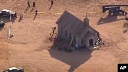 This aerial video image provided by KOAT 7 News, shows Santa Fe County Sheriff's Officers responding to the scene of a fatal accidental shooting at a Bonanza Creek, Ranch movie set near Santa Fe, N.M., Oct. 21, 2021.