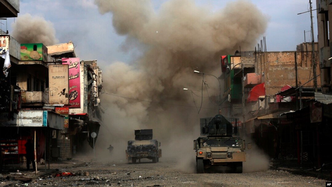 Three roadside bombs laid by Islamic State group militants explode in a western Mosul neighborhood, killing one of the Iraqi engineers attempting to defuse the devices, March 8, 2017.