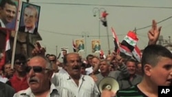 A rally in support of Syrian leader Bashar Al-Assad - on the Israeli side of the demilitarized zone